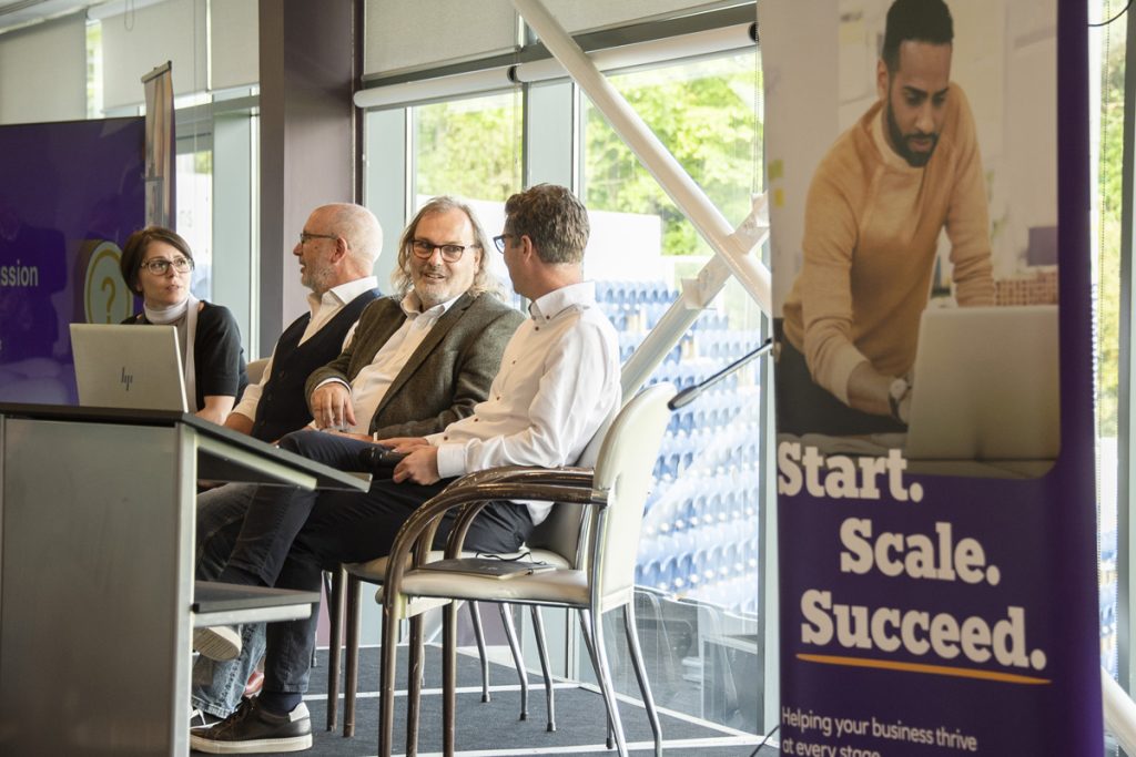 Warming up for the panel session at the AI event with all the panellists